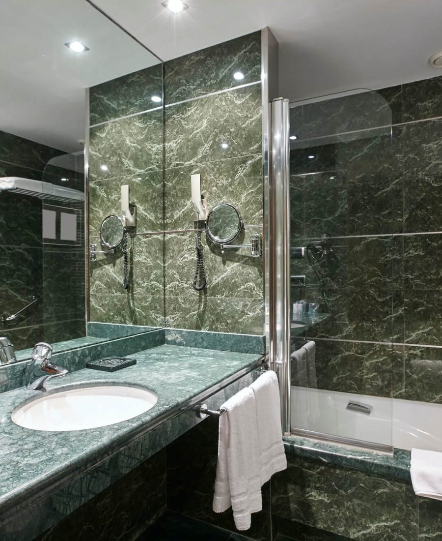 luxury-bathroom-in-green-marble-decoraton-hotel-home-interior-horizontal-1.jpg